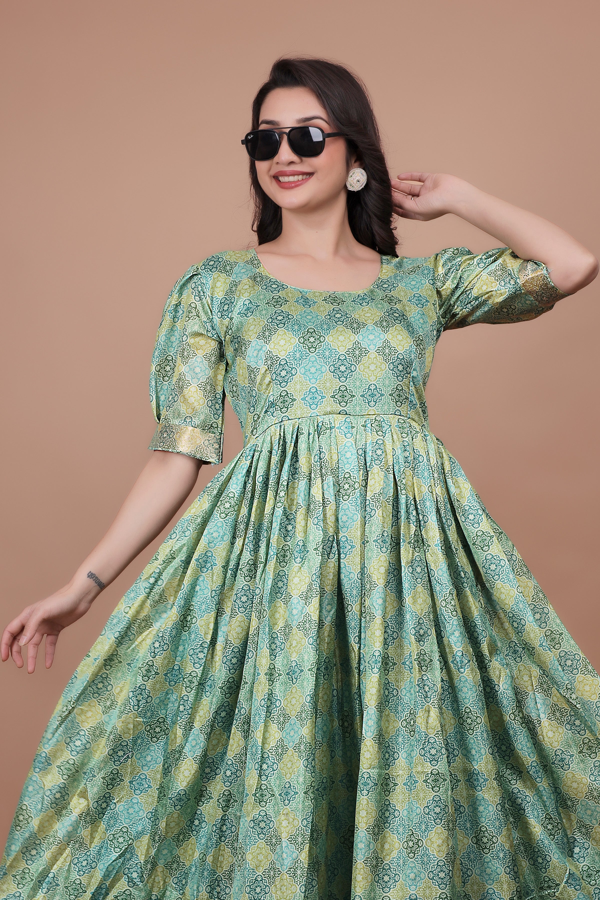 Green Pure Dolla Silk Designer Gown for Women – Zari Woven Border | 5 Meter Flair | Fully Stitched & Ready to Wear