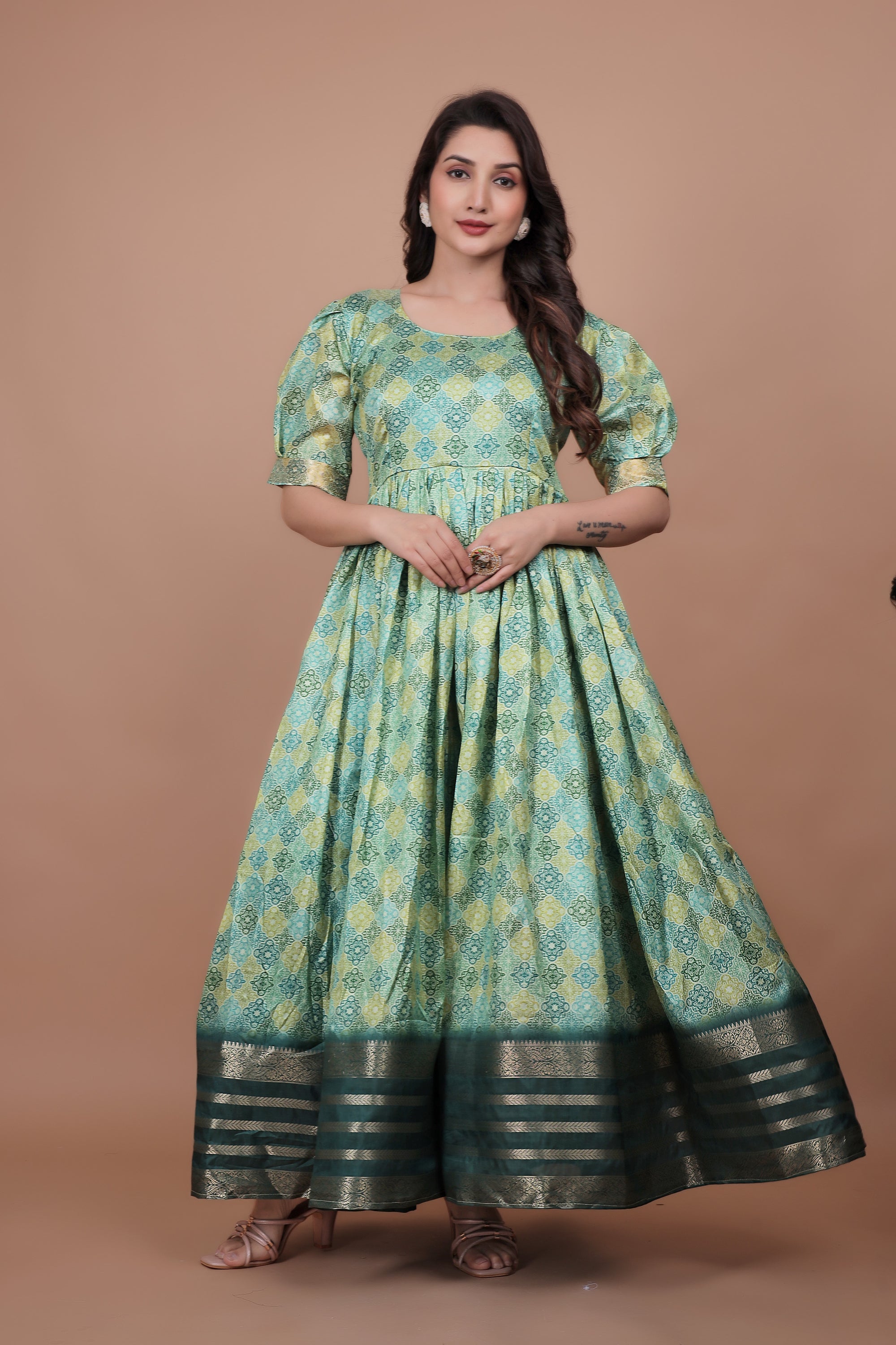 Green Pure Dolla Silk Designer Gown for Women – Zari Woven Border | 5 Meter Flair | Fully Stitched & Ready to Wear