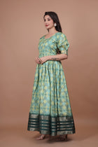 Green Pure Dolla Silk Designer Gown for Women – Zari Woven Border | 5 Meter Flair | Fully Stitched & Ready to Wear