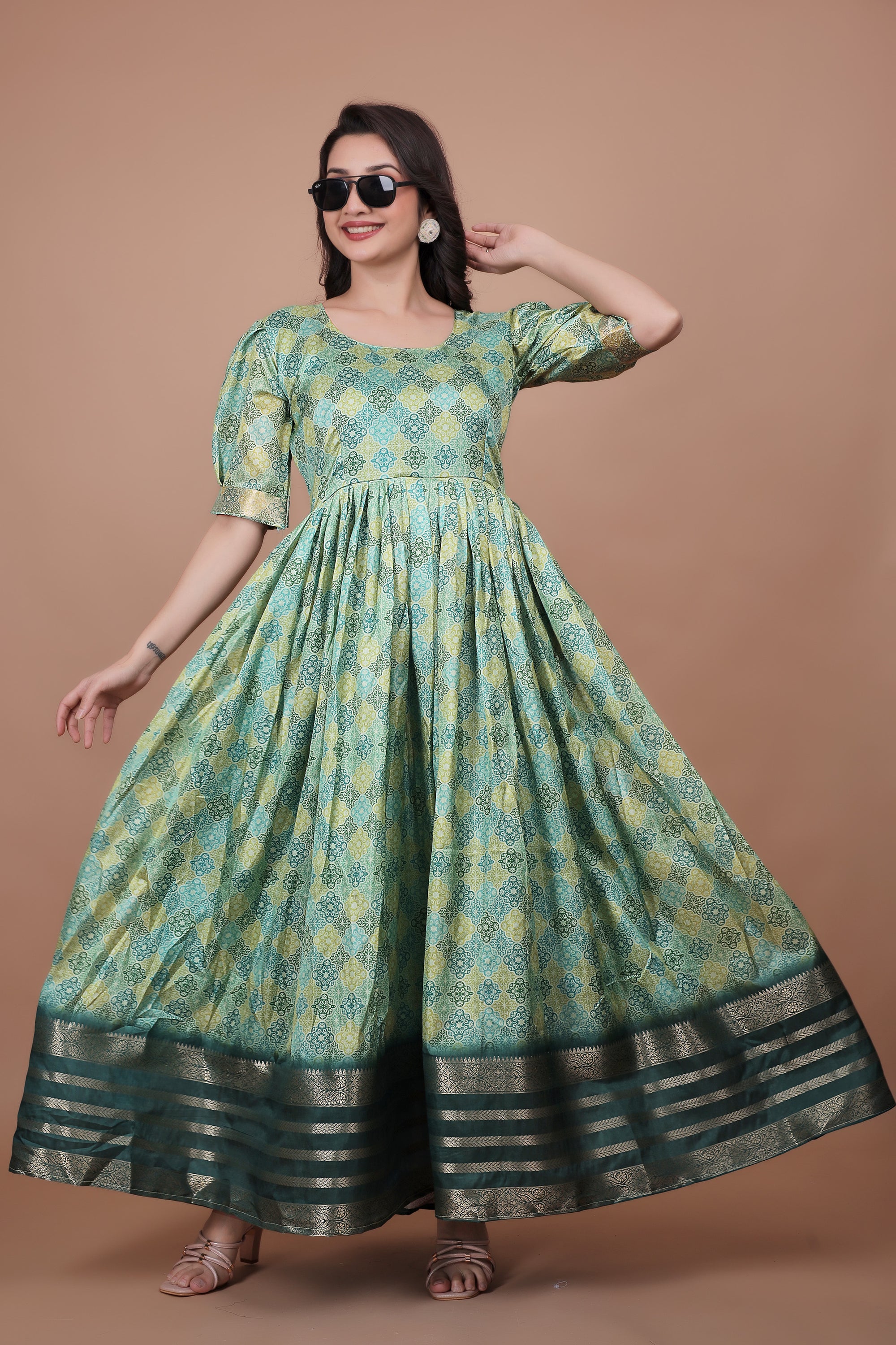 Green Pure Dolla Silk Designer Gown for Women – Zari Woven Border | 5 Meter Flair | Fully Stitched & Ready to Wear