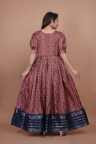 Maroon Pure Dolla Silk Designer Gown for Women – Zari Woven Border | 5 Meter Flair | Fully Stitched & Ready to Wear