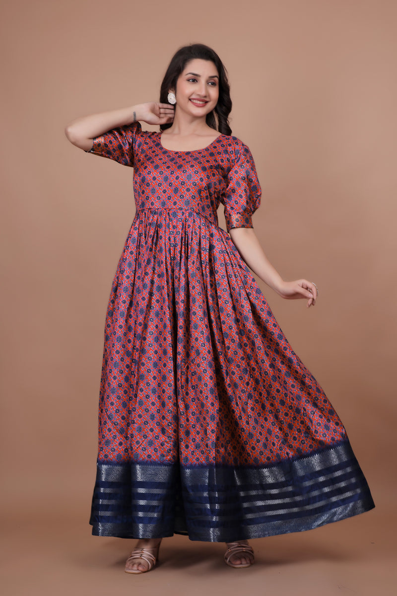 Maroon Pure Dolla Silk Designer Gown for Women – Zari Woven Border | 5 Meter Flair | Fully Stitched & Ready to Wear