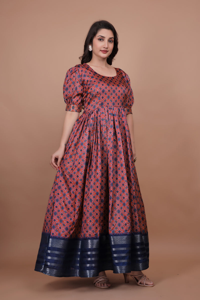 Maroon Pure Dolla Silk Designer Gown for Women – Zari Woven Border | 5 Meter Flair | Fully Stitched & Ready to Wear