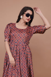 Maroon Pure Dolla Silk Designer Gown for Women – Zari Woven Border | 5 Meter Flair | Fully Stitched & Ready to Wear