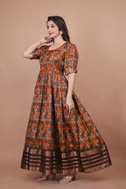 Maroon Pure Dolla Silk Designer Gown for Women – Zari Woven Border | 5 Meter Flair | Fully Stitched & Ready to Wear